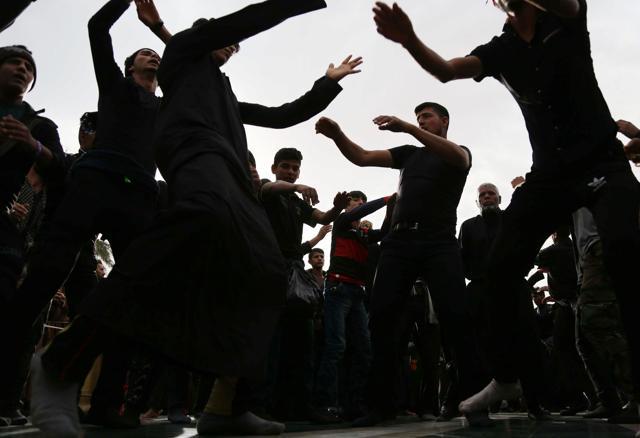 Shia Muslim pilgrims perform acts of worship on the last day of the Arbaeen religious festival on November 21, 2016, in the holy Iraqi city of Karbala, 80 kilometres south of Baghdad. (AFP) Shia Muslim pilgrims perform acts of worship on the last day of the Arbaeen religious festival on November 21, 2016, in the holy Iraqi city of Karbala, 80 kilometres south of Baghdad. (AFP)