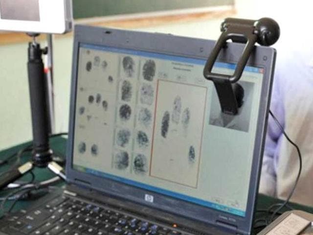 Based on the fingerprint pattern, a computer-generated assessment of the child’s learning styles and intelligence potential is mapped.(Rep pic/AFP)