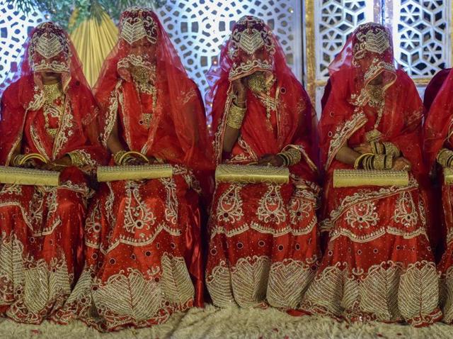 The brides wait for the grooms to arrive. (KUNAL PATIL/HT PHOTO) The brides wait for the grooms to arrive. (KUNAL PATIL/HT PHOTO)