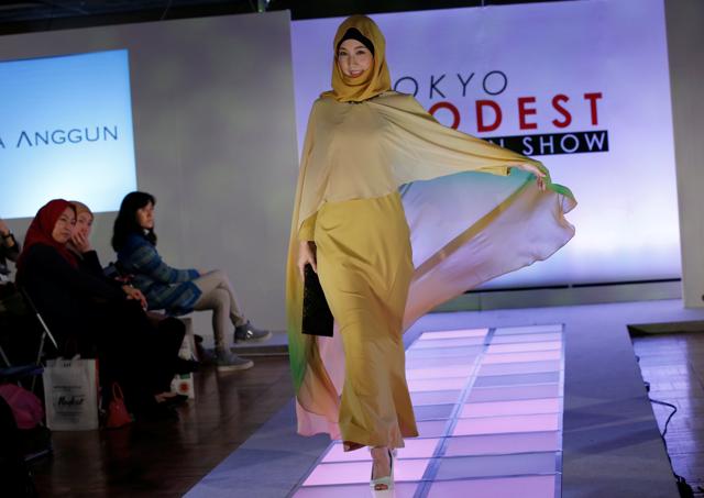 Among popular designs were floral patterns that were adorning long robe garments and matching headscarves. (Toru Hanai/REUTERS) Among popular designs were floral patterns that were adorning long robe garments and matching headscarves. (Toru Hanai/REUTERS)