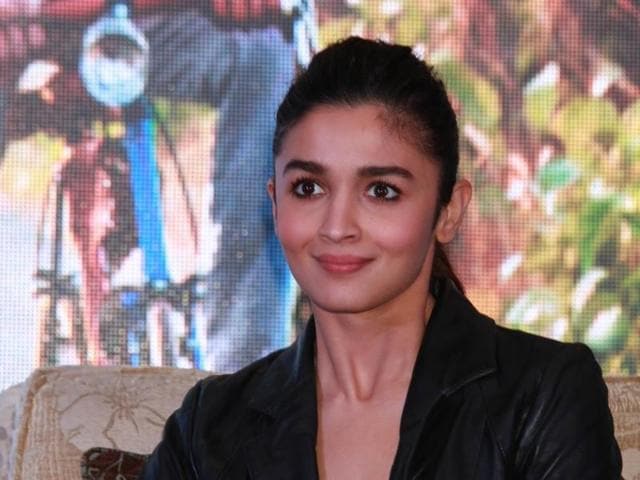 Alia Bhatt joined Shah Rukh Khan and director Gauri Shinde at a press conference to promote Dear Zindagi. (IANS)