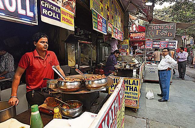 The Phucchka and Roll shop at C R Park Market-1 wears an expectant look, waiting for customers to show up. (Virendra Singh Gosain/HT PHOTO) The Phucchka and Roll shop at C R Park Market-1 wears an expectant look, waiting for customers to show up. (Virendra Singh Gosain/HT PHOTO)