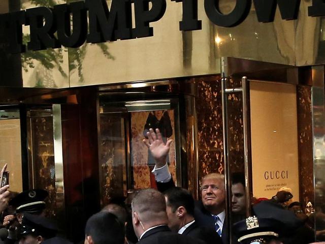 Republican presidential nominee Donald Trump waves to supporters outside the front door of Trump Tower where he lives in the Manhattan borough of New York.(REUTERS) Republican presidential nominee Donald Trump waves to supporters outside the front door of Trump Tower where he lives in the Manhattan borough of New York.(REUTERS)