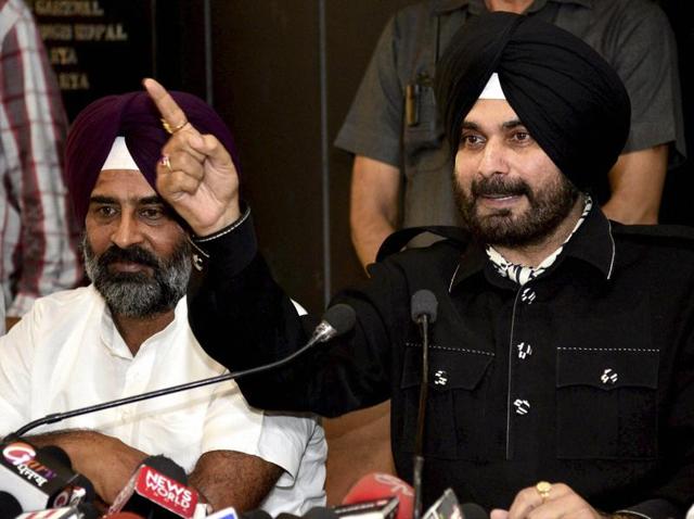 Navjot Singh Sidhu and Pargat Singh at a press conference in Chandigarh. (PTI File) Navjot Singh Sidhu and Pargat Singh at a press conference in Chandigarh. (PTI File)