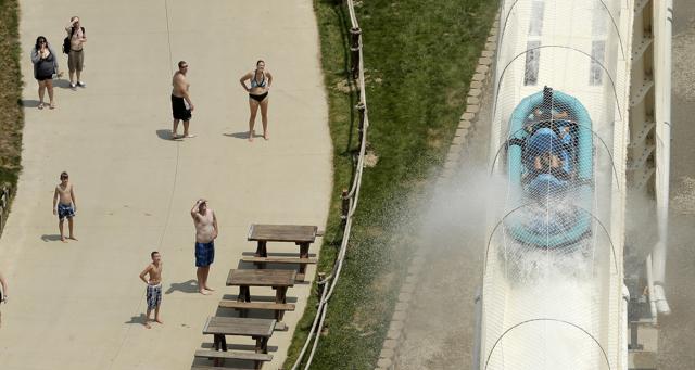 In this July 9, 2014, file photo, riders are propelled by jets of water as they go over a hump while riding a waterslide called Verruckt at Schlitterbahn Waterparks and Resorts in Kansas City. (AP) In this July 9, 2014, file photo, riders are propelled by jets of water as they go over a hump while riding a waterslide called Verruckt at Schlitterbahn Waterparks and Resorts in Kansas City. (AP)