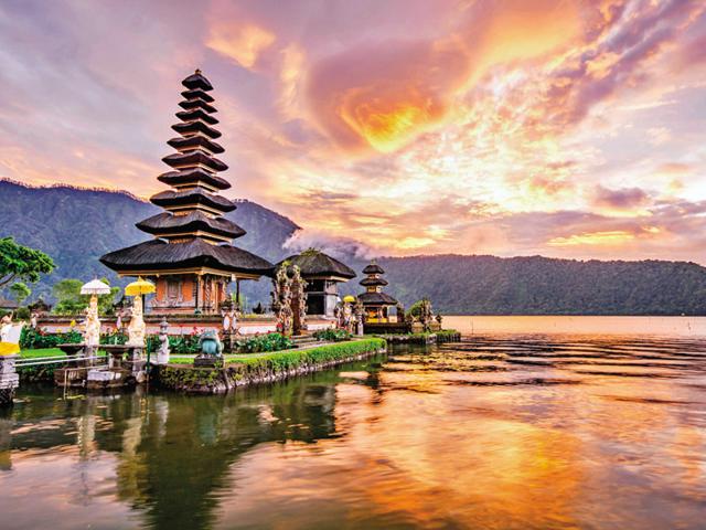 The Tanah Lot Temple in Bali is guarded by the mighty ocean itself and may or may not grant you access depending on the tides.(Shutterstock)