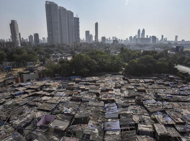 Dhobi Ghat, a 12-acre prime land overlooking Arabian Sea and Mahalaxmi Race Course, is all set for revamp. Of the total 5,000 structures, around 1,500 have been demolished and 850 will be razed on Friday. (KUNAL PATIL/HT PHOTO) 