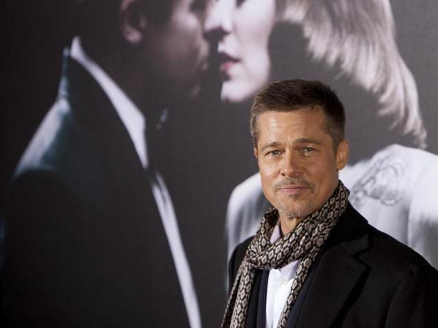 US actor Brad Pitt poses for photographers during a photocall for the premiere of the new film Allied in Madrid, Spain.(AP)