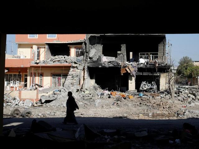A flag bearing a portrait of Prophet Mohammed's grandson, Imam Hussein, flutters above an Iraqi Special Forces vehicle patrolling a northeastern district of the city of Mosul on November 24, 2016. (AFP) A flag bearing a portrait of Prophet Mohammed's grandson, Imam Hussein, flutters above an Iraqi Special Forces vehicle patrolling a northeastern district of the city of Mosul on November 24, 2016. (AFP)