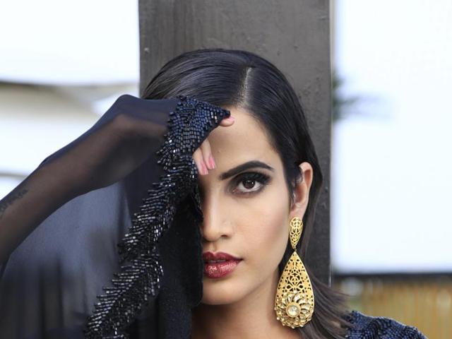 All that glitters: Red, glitter lips, dramatic eyes and slick hair — these beauty moves make a strong case for a cocktail soirée. And here’s the styling tip — when wearing gold, feel free to go bold. (Waseem Gashroo/ HT Photo, Shara Ashraf/Concept and Styling) All that glitters: Red, glitter lips, dramatic eyes and slick hair — these beauty moves make a strong case for a cocktail soirée. And here’s the styling tip — when wearing gold, feel free to go bold. (Waseem Gashroo/ HT Photo, Shara Ashraf/Concept and Styling)