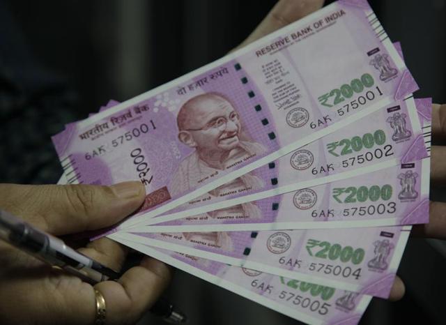 Since the new currency notes are in short supply, the BCCI decided to buy cash cards for the players(AP)