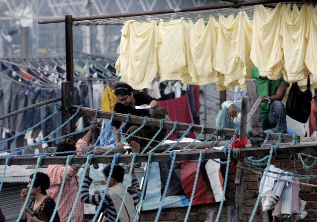 Kiran Rao shoots for her film Dhobi Ghat, on location in Mahalaxmi. The iconic area in the heart of Mumbai has featured in numerous Bollywood films. (Anshuman Poyrekar / HT Photo) Kiran Rao shoots for her film Dhobi Ghat, on location in Mahalaxmi. The iconic area in the heart of Mumbai has featured in numerous Bollywood films. (Anshuman Poyrekar / HT Photo)