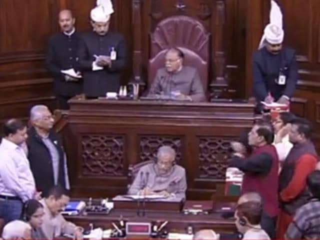 Opposition members protest in the Well, demanding an apology from PM Modi for accusing his critics of supporting black money. (ANI Photo/RSTV) Opposition members protest in the Well, demanding an apology from PM Modi for accusing his critics of supporting black money. (ANI Photo/RSTV)