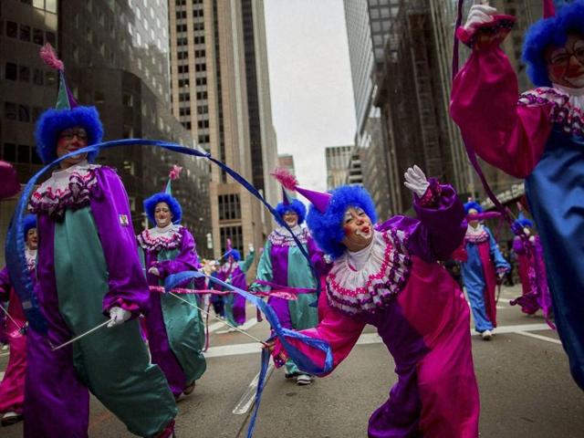 Clowns perform as they march along Sixth Avenue. (AP) Clowns perform as they march along Sixth Avenue. (AP)
