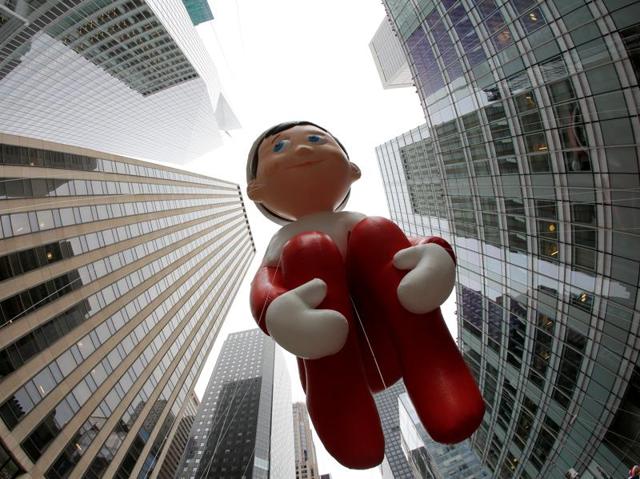The Elf on the Shelf balloon is carried down 6th Avenue. (REUTERS) The Elf on the Shelf balloon is carried down 6th Avenue. (REUTERS)