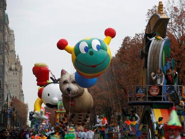 Balloons are carried down Central Park West. Balloons are carried down Central Park West.