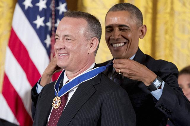 President Barack Obama presents the Presidential Medal of Freedom to actor Tom Hanks during a ceremony in the East Room of the White House, Tuesday, November 22, 2016. (AP) President Barack Obama presents the Presidential Medal of Freedom to actor Tom Hanks during a ceremony in the East Room of the White House, Tuesday, November 22, 2016. (AP)