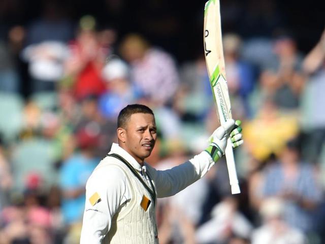 Australia batsman Usman Khawaja acknowledges the crowd after completing his century during the second day of the third Test against South Africa at the Adelaide Oval. He remained unbeaten on 138 at the end of the day’s play. (AFP) Australia batsman Usman Khawaja acknowledges the crowd after completing his century during the second day of the third Test against South Africa at the Adelaide Oval. He remained unbeaten on 138 at the end of the day’s play. (AFP)