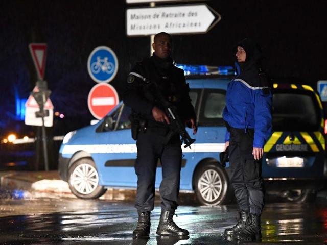 French Gendarmes control cars near the village in southern France. The French gendarmerie says a masked gunman has burst into a retirement home for monks in southern France and killed an elderly woman with a knife. (AP Photo) French Gendarmes control cars near the village in southern France. The French gendarmerie says a masked gunman has burst into a retirement home for monks in southern France and killed an elderly woman with a knife. (AP Photo)