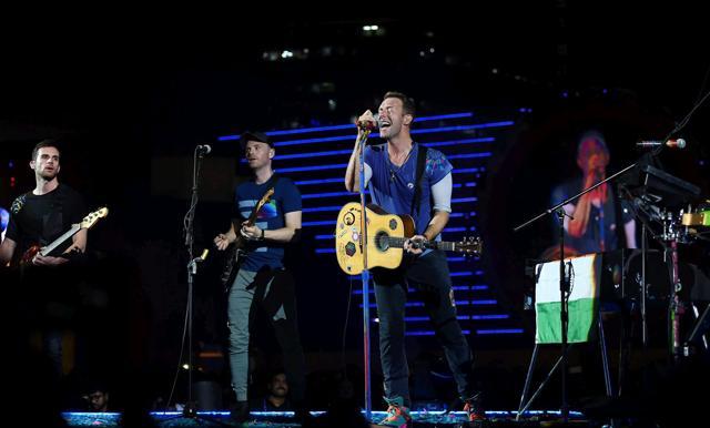 British rock band members perform during the Global Citizen concert in Mumbai. (Mitesh Bhuvad/PTI) British rock band members perform during the Global Citizen concert in Mumbai. (Mitesh Bhuvad/PTI)