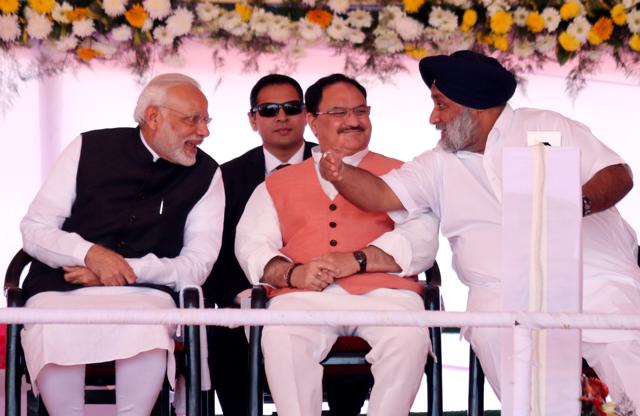 PM Modi, Union health minister JP Nadda and Punjab deputy CM Sukhbir Singh Badal on stage at the AIIMS foundation-laying function in Bathinda on Friday. (Sanjeev Sharma/HT Photo) PM Modi, Union health minister JP Nadda and Punjab deputy CM Sukhbir Singh Badal on stage at the AIIMS foundation-laying function in Bathinda on Friday. (Sanjeev Sharma/HT Photo)