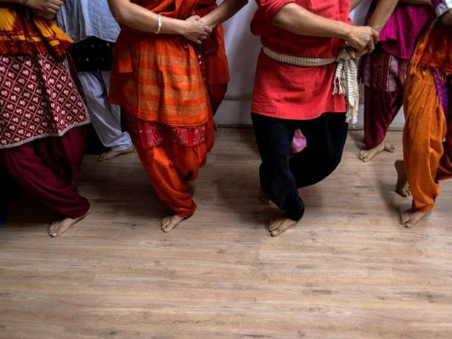 Dance students participate in an Odissi dance lesson under the tutelage of acclaimed dancer Madhumita Raut inside a garage-turned-studio in New Delhi. (AFP) Dance students participate in an Odissi dance lesson under the tutelage of acclaimed dancer Madhumita Raut inside a garage-turned-studio in New Delhi. (AFP)