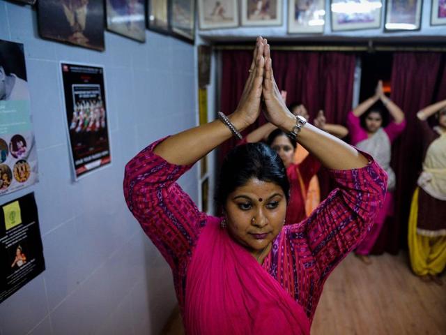 Dance student Priyanka Venkateswaran (36) participates in a lesson. Odissi is primarily performed by women but male dancers also feature. (AFP) Dance student Priyanka Venkateswaran (36) participates in a lesson. Odissi is primarily performed by women but male dancers also feature. (AFP)