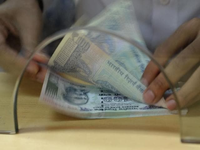 The Reserve Bank of India’s Employees Association office bearers apprehended that the pressure on their colleagues will now be monumental after the removal of notes exchange in the commercials banks. (AFP Photo) The Reserve Bank of India’s Employees Association office bearers apprehended that the pressure on their colleagues will now be monumental after the removal of notes exchange in the commercials banks. (AFP Photo)