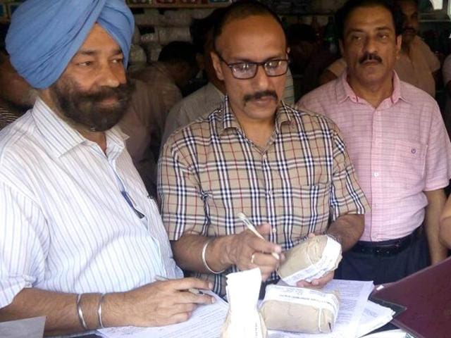 The health official collecting samples of dairy products in Jalandhar.(HT File Photo)