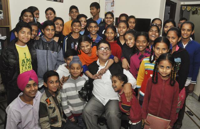 Vivek Joshi along with his students at his residence in Jalandhar on Thursday. (Sikander Singh Chopra/HT)