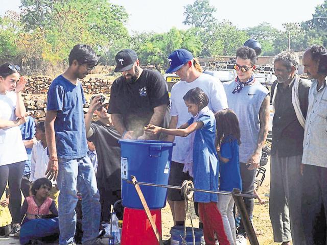 Nyjah Huston sharing a light moment with tribal children in Janwaar. (HT Photos) Nyjah Huston sharing a light moment with tribal children in Janwaar. (HT Photos)