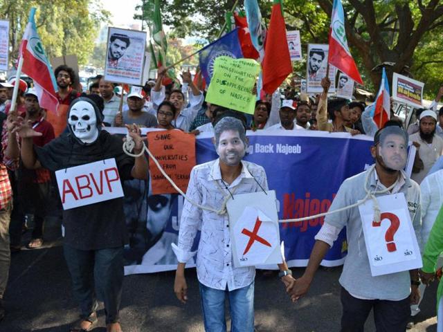 JNU students carry out a dharna to find Najeeb Ahmed, a fellow student who has been missing since October 15, 2016. Ahmed disappeared after an altercation with alleged ABVP members.(PTI) JNU students carry out a dharna to find Najeeb Ahmed, a fellow student who has been missing since October 15, 2016. Ahmed disappeared after an altercation with alleged ABVP members.(PTI)
