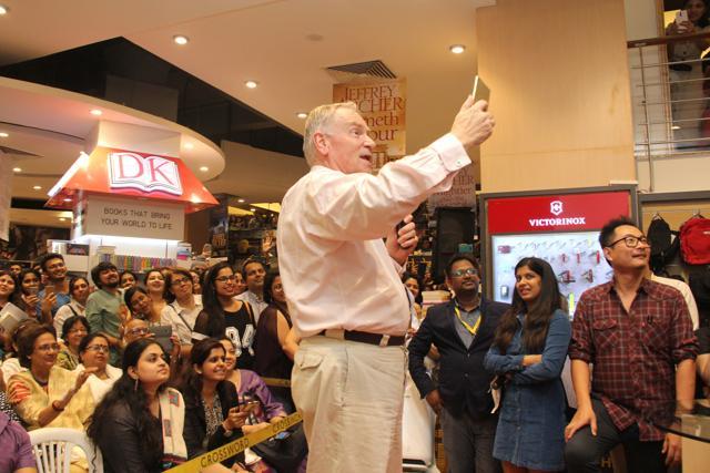 Jeffrey Archer takes a selfie with fans at a bookstore during a tour to launch his new book in India. (HT Photo)
