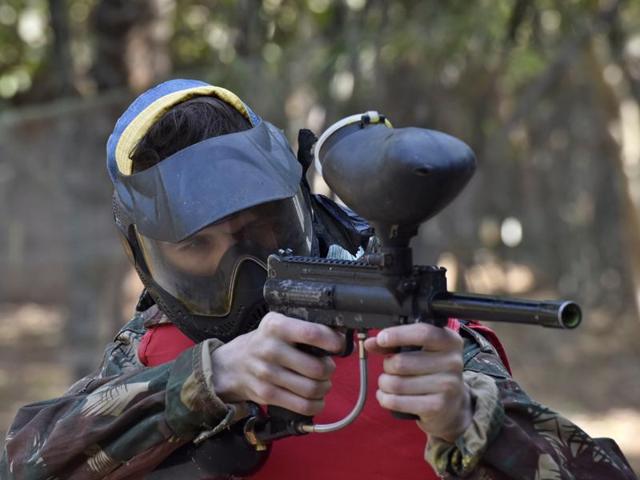 A visitor tries his hand at paintballing at the Garden of Five Senses on Friday. (Sanjeev Verma/HT Photo) A visitor tries his hand at paintballing at the Garden of Five Senses on Friday. (Sanjeev Verma/HT Photo)