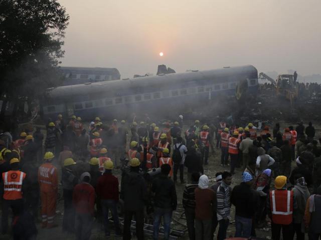 Rescuers at an accident site where 14 coaches of an overnight passenger train rolled off the track near Pukhrayan village in Kanpur Dehat district, Uttar Pradesh, on November 20, 2016. The mishap, believed to have been caused due to a fracture in the rail tracks, killed 150 passengers and dozens of others. (Rajesh Kumar Singh/AP) Rescuers at an accident site where 14 coaches of an overnight passenger train rolled off the track near Pukhrayan village in Kanpur Dehat district, Uttar Pradesh, on November 20, 2016. The mishap, believed to have been caused due to a fracture in the rail tracks, killed 150 passengers and dozens of others. (Rajesh Kumar Singh/AP)