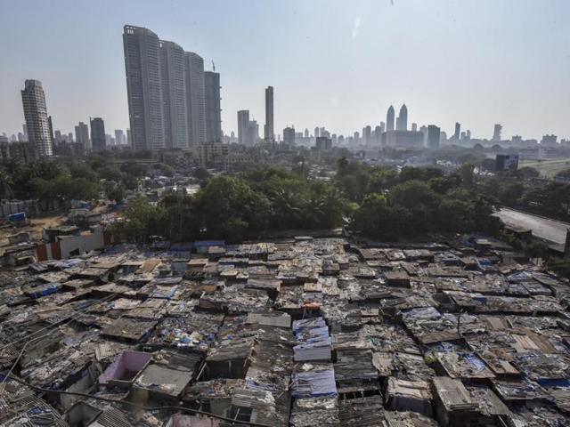 Mumbai’s heritage washing zone and the world’s largest open-air laundry, popularly known as ‘Dhobi Ghat’, is set to become slum-free. Spread across 12 acres, Dhobi Ghat  houses nearly 5,000 slum tenements and 25,000 people from the dhobi community. On November 25, about 800 houses were razed, marking the commencement of the redevelopment project. (Kunal Patil/HT Photo) 