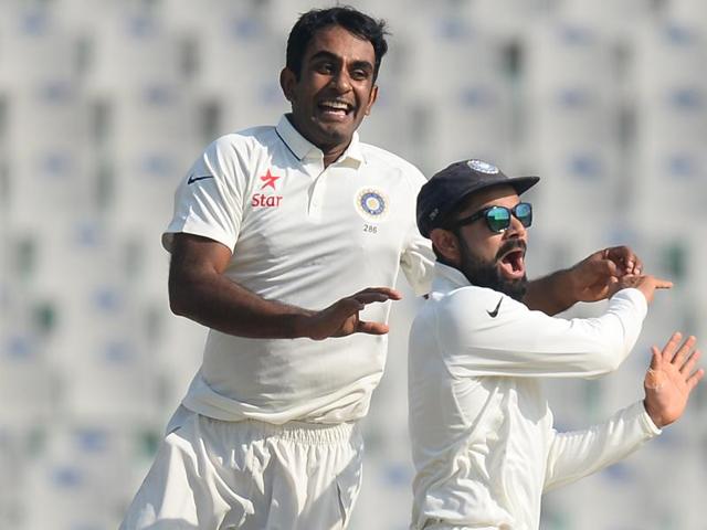 Jayant Yadav (left) celebrates with his captain Virat Kohli after dismissing England’s Joe Root during the first day of the third Test cricket at the PCA Stadium in Mohali. Jayant scalped two wickets on Saturday.(AFP) Jayant Yadav (left) celebrates with his captain Virat Kohli after dismissing England’s Joe Root during the first day of the third Test cricket at the PCA Stadium in Mohali. Jayant scalped two wickets on Saturday.(AFP)
