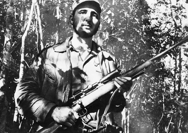 In this Feb 26, 1957 file photo, Cuba's leader Fidel Castro stands in an unknown location in Cuba. (AP) In this Feb 26, 1957 file photo, Cuba's leader Fidel Castro stands in an unknown location in Cuba. (AP)