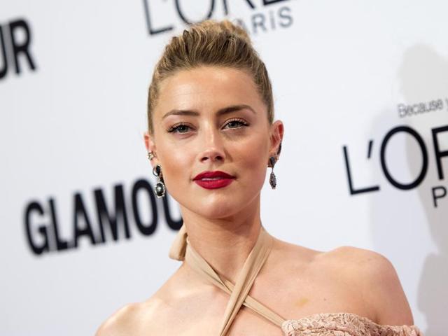 Amber Heard teamed up with the ‘#GirlGaze Project’ to create an emotionally-charged two-minute video, where the actress speaks directly to the camera, urging women to “raise your voice” because it is the “most powerful” thing.(AFP)