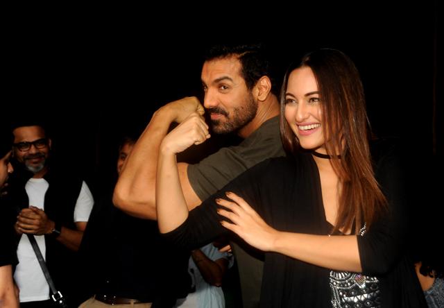 John Abraham and Sonakshi Sinha attend a promotional event for the upcoming Hindi film Force 2 in Mumbai. (AFP)