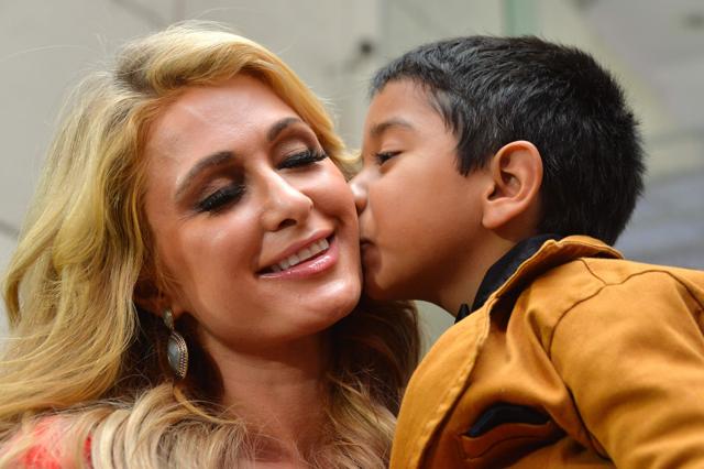 US socialite Paris Hilton greets children at the Teleton foundation in Tlanepantla, Mexico state, Mexico on November 10, 2016. (AFP)
