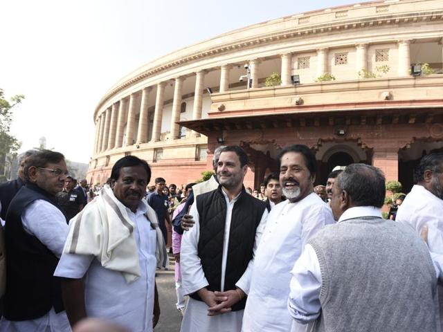 Congress Vice president Rahul Gandhi with MPs of Opposition parties during a protest outside Parliament against the government’s move to demonetise high tender notes, in New Delhi on Wednesday. (PTI) Congress Vice president Rahul Gandhi with MPs of Opposition parties during a protest outside Parliament against the government’s move to demonetise high tender notes, in New Delhi on Wednesday. (PTI)