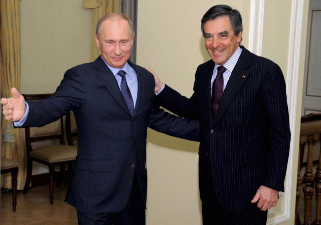 In this Thursday, March 21, 2013 file picture Russian President Vladimir Putin, left, meets with former French Prime Minister Francois Fillon in the Novo-Ogaryovo residence outside Moscow. (AP Photo) In this Thursday, March 21, 2013 file picture Russian President Vladimir Putin, left, meets with former French Prime Minister Francois Fillon in the Novo-Ogaryovo residence outside Moscow. (AP Photo)