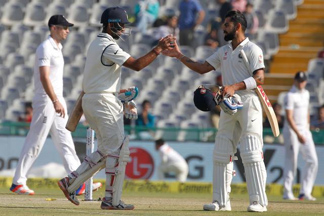 Virat Kohli and Cheteshwar Pujara shared a magnificent partnership to help India stay on top. (Photo by: Deepak Malik/ BCCI/ SPORTZPICS) Virat Kohli and Cheteshwar Pujara shared a magnificent partnership to help India stay on top. (Photo by: Deepak Malik/ BCCI/ SPORTZPICS)