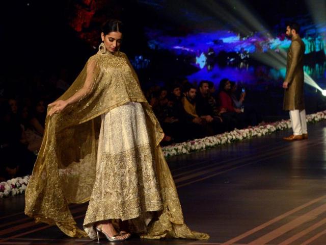 A model wearing designer Isalan Iqbal bridal look during a fashion show. (AFP) A model wearing designer Isalan Iqbal bridal look during a fashion show. (AFP)