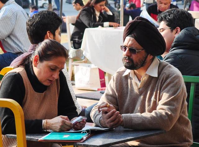 People having food outside the Back packers café at Elante Mall , Chandigarh on Sunday. (Karun Sharma/ HT) People having food outside the Back packers café at Elante Mall , Chandigarh on Sunday. (Karun Sharma/ HT)