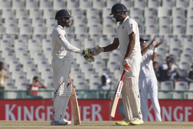 Ravichandran Ashwin of India and Ravindra Jadeja on day 3 of the Mohali Test on Monday (Photo by: BCCI)