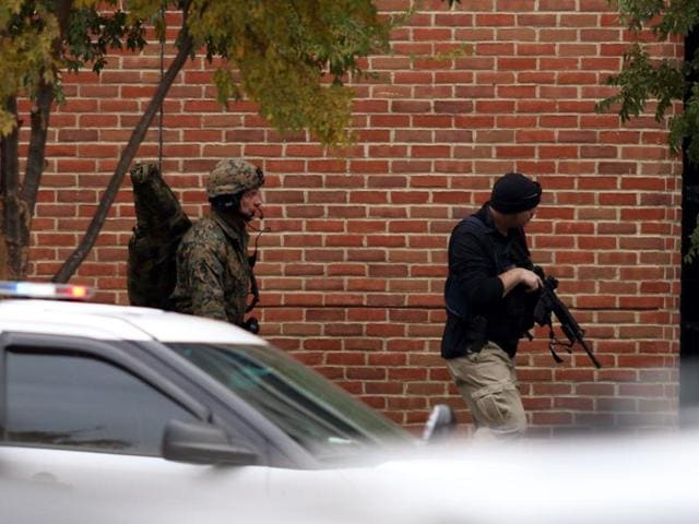 Law enforcement officials are seen outside of a parking garage on the campus of Ohio State University as they respond to an active attack in Columbus, Ohio, on November 28, 2016. (AFP) Law enforcement officials are seen outside of a parking garage on the campus of Ohio State University as they respond to an active attack in Columbus, Ohio, on November 28, 2016. (AFP)