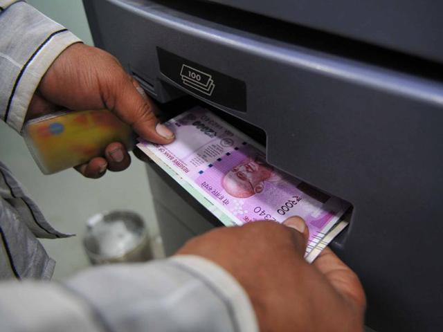 People stand in a queue outside the State Bank of India in New Delhi to exchange old Rs 500 and Rs. 1000 notes and withdraw money after the government announced demonetisation of the big notes early this month. (Arun Sharma/HT PHOTO) People stand in a queue outside the State Bank of India in New Delhi to exchange old Rs 500 and Rs. 1000 notes and withdraw money after the government announced demonetisation of the big notes early this month. (Arun Sharma/HT PHOTO)