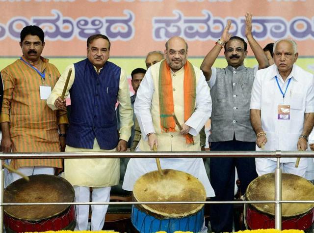 BJP president Amit Shah, Union minister Ananth Kumar, Karnataka BJP president BS Yeddyurappa and former Karnataka CM Jagadish Shettar beat the drum to inaugurate the OBC Ekta Rally at Palace Grounds in Bengaluru on Sunday. (PTI) BJP president Amit Shah, Union minister Ananth Kumar, Karnataka BJP president BS Yeddyurappa and former Karnataka CM Jagadish Shettar beat the drum to inaugurate the OBC Ekta Rally at Palace Grounds in Bengaluru on Sunday. (PTI)